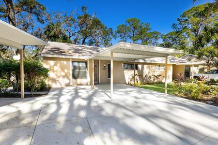 4873 VILLAGE GARDENS DRIVE