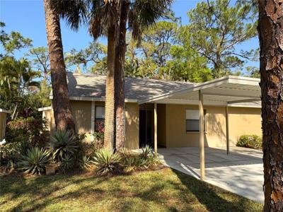 4933 VILLAGE GARDENS DRIVE