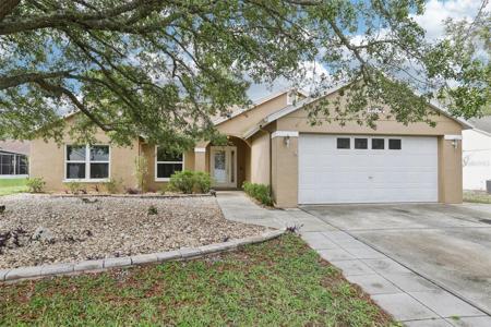 10304 RAINBOW OAKS DRIVE