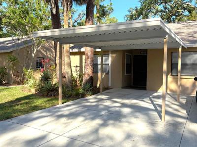4933 VILLAGE GARDENS DRIVE