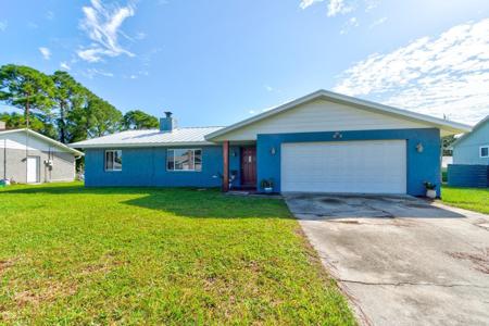 3323 PINE TREE DRIVE