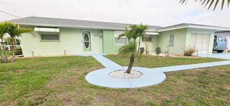 392 E TARPON BOULEVARD NW