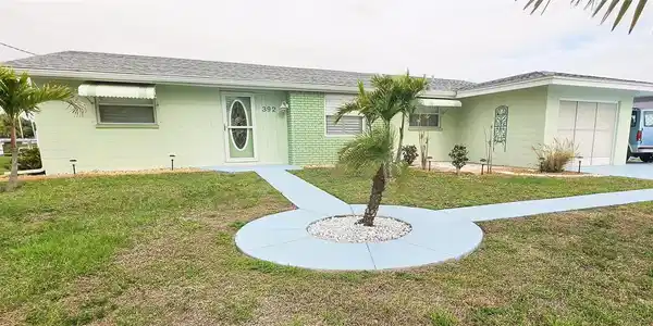 392 E TARPON BOULEVARD NW
