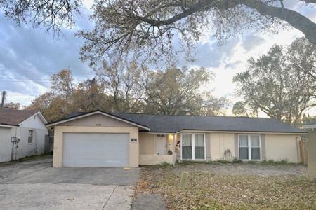 6702 VILLAGE GROVE COURT