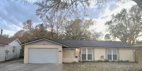 6702 VILLAGE GROVE COURT