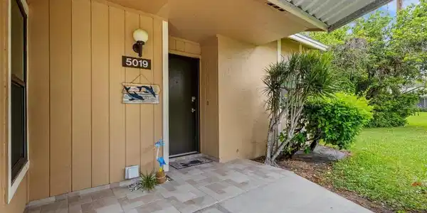 5019 VILLAGE GARDENS DRIVE