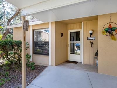 4869 VILLAGE GARDENS DRIVE