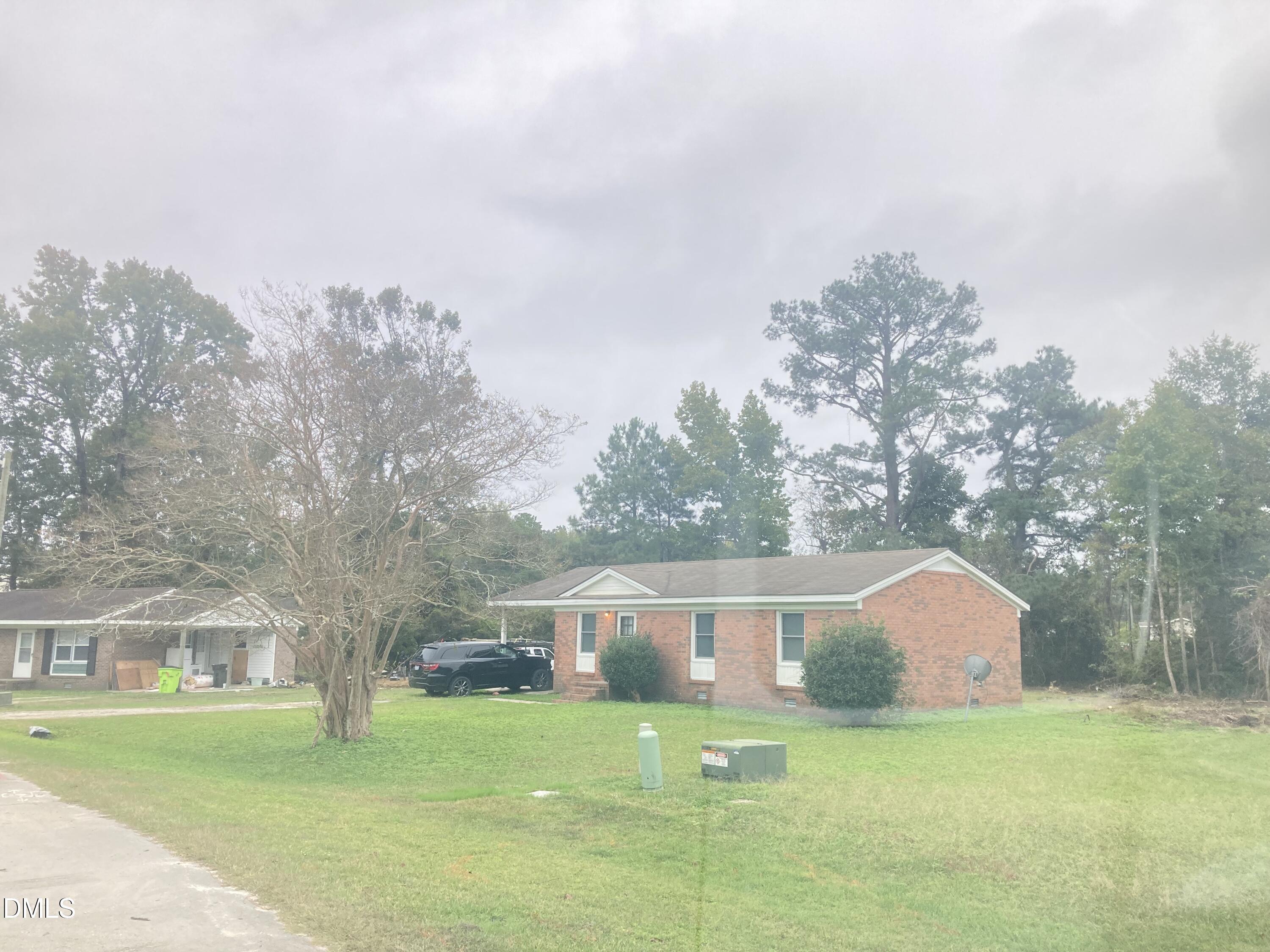 Image 2: 1405 Mockingbird Lane_side view_IMG_4724