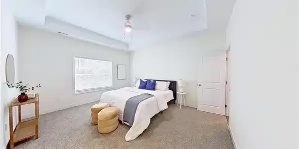 Image 4: large primary bedroom