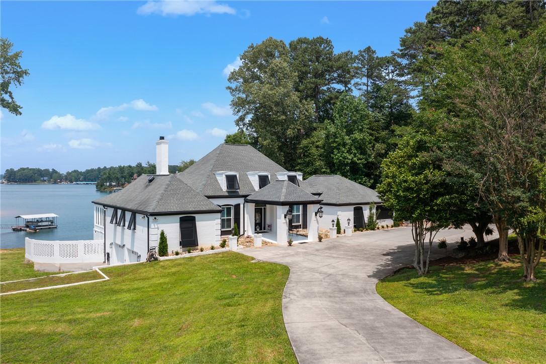 Image 1: A rare and refined offering on Lake Keowee&mdash;this un